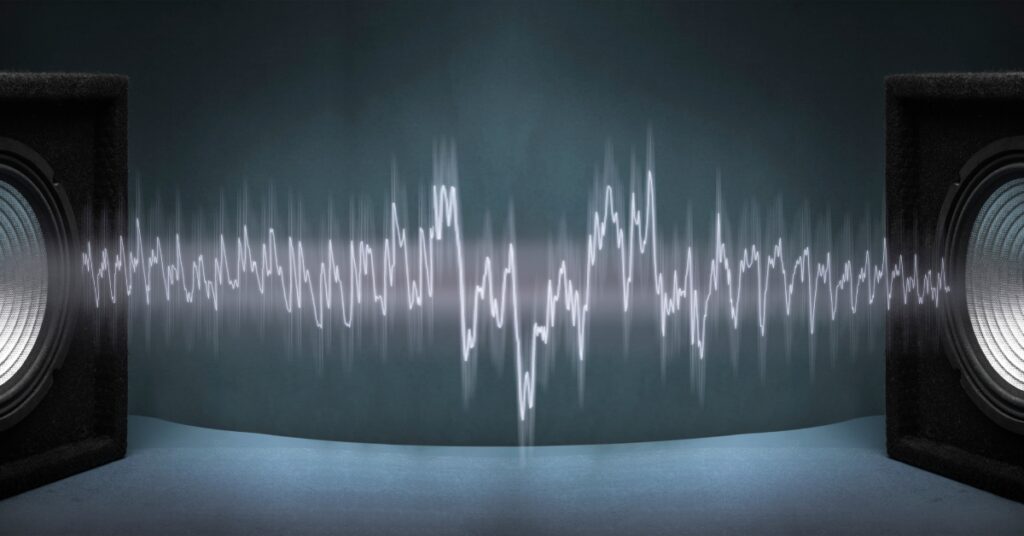 Speakers with audio coming out of them representing Equivalent Input Noise.